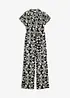 Mönstrad jumpsuit av satin, bonprix